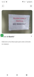a screenshot of a phone screen with a sign on it at quarto colhao casal no chao in Chapada dos Guimarães