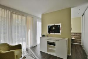 Et tv og/eller underholdning på Duhner Strandhus, S3