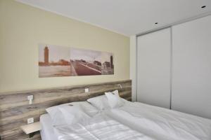 En eller flere senge i et værelse på Duhner Strandhus, S3