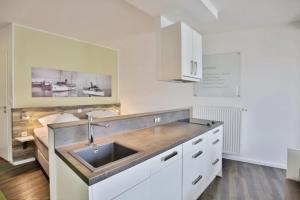 Køkken eller tekøkken på Duhner Strandhus, S306