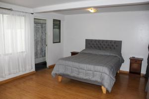 Postel nebo postele na pokoji v ubytování Cómoda Casa Cerca de la playa y el Mall 3B, 3D