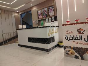 a restaurant with a dessert counter in a mall at اصيل الفاخره المخدومه in Taif
