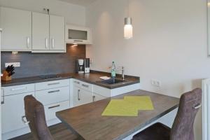 Køkken eller tekøkken på Duhner Strandhus, S303