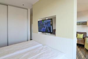 En eller flere senge i et værelse på Duhner Strandhus, S303 + 3 billeder