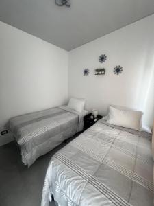 Postel nebo postele na pokoji v ubytování Home Sweet Home