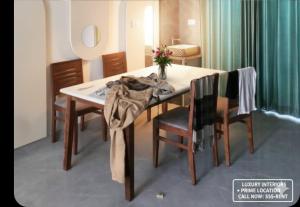 a room with a table with chairs at Full villa welcome for you 4bhk available in Jaipur