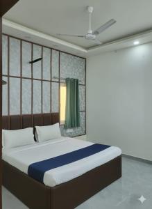 En eller flere senge i et værelse på Full villa welcome for you