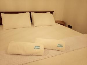 Postel nebo postele na pokoji v ubytování Rankaty Residence