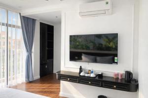 TV/trung tâm giải trí tại Ocean Park Homestay +65 ảnh