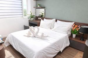 Giường trong phòng chung tại Ocean Park Homestay