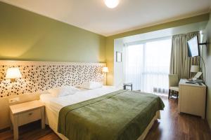 Postel nebo postele na pokoji v ubytování Hotel Jurmala Spa