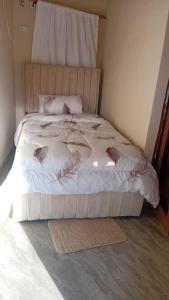 Postel nebo postele na pokoji v ubytování Infinity 555 Lodge