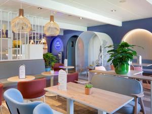 Et opholdsområde på Novotel Aix-en-Provence Pont de L'Arc