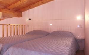 Postel nebo postele na pokoji v ubytování Casa Das Romãs
