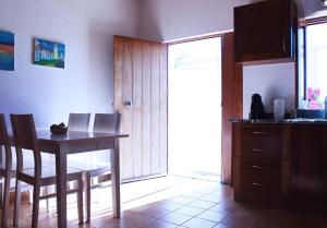 Kuchyň nebo kuchyňský kout v ubytování Casa Das Romãs
