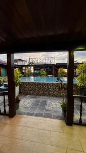 Swimmingpoolen hos eller tæt på Norvilla Rooftop Pantai Cenang