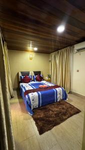 En eller flere senge i et værelse på Norvilla Rooftop Pantai Cenang