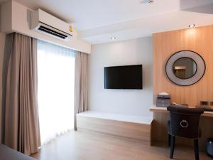 Et tv og/eller underholdning på Iconic Hotel