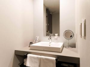 Phòng tắm tại Comfort Hotel ERA Sapporo North