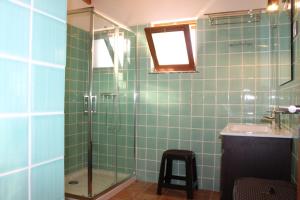Koupelna v ubytování Casa Das Romãs + 26 fotografií