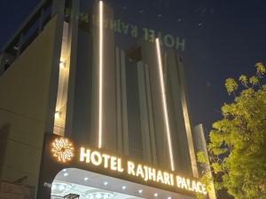 a hotel building with a sign in front of it at Hotel Raj Hari Palace in Jodhpur