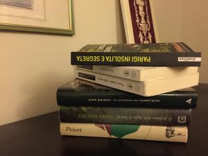 a stack of books sitting on top of a table at Bozzi 1910 in Bari