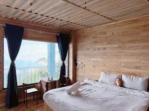 Giường trong phòng chung tại Dê Homestay & Restaurant Tà Xùa