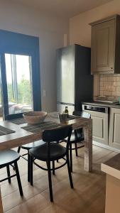 Køkken eller tekøkken på Το Σπίτι της Ελιάς