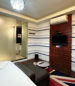 Et tv og/eller underholdning på 辰沐溫泉民宿