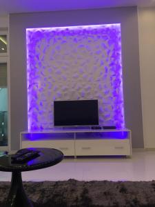 A television and/or entertainment centre at Synagogue Gozsdu Private Apartments