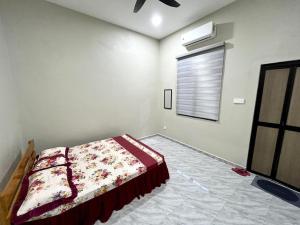 Postel nebo postele na pokoji v ubytování Baba Homestay