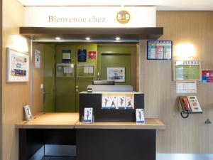 Лоби или рецепция в B&B HOTEL Rennes Nord St Grégoire