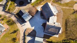 an overhead view of a house with a pool at Ferienhaus Baltic in Lobbe in Lobbe