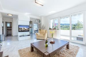 Televisyen dan/atau pusat hiburan di Apartment Aquamarin