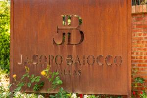 un cartello per le ville aubzona bloxocozona di Casa Febea a Chiusi