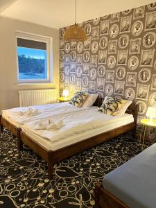 Postel nebo postele na pokoji v ubytování Pensjonat Poranna Rosa