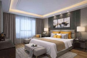 En eller flere senge i et værelse på Vista Luxurious Resort and Funpark