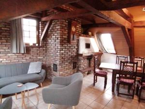 Khu vực ghế ngồi tại Ferienwohnung Flämisches Weinhaus