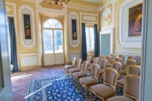 a room with a bunch of chairs in it at Villa Rinalducci in Fano +72 photos