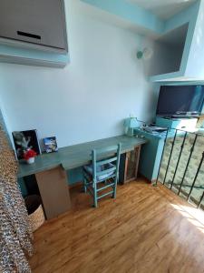 Et tv og/eller underholdning på Gîte Milly - 2 studios en coeur de ville