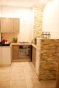 Kuchyňa alebo kuchynka v ubytovaní Apartament Bukowe Wzgórze