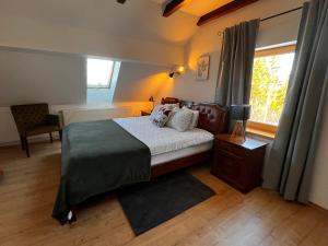 En eller flere senge i et værelse på Green House