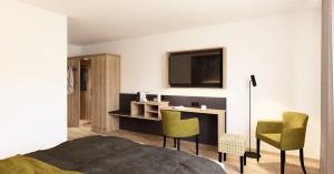 Et tv og/eller underholdning på Wohlfühlhotel zur Grässelmühle