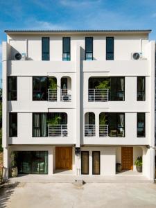 an image of a white building at ELYSIUM Villa Khao Lak in Khao Lak