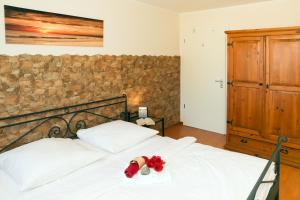 Giường trong phòng chung tại Landhaus zum Strande - 44-07 +4 ảnh