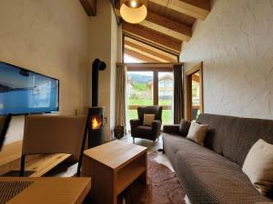 Et tv og/eller underholdning på Chalets Jasná Centrum APARTMENT L - Free Jacuzzi & Sauna and Chopok view