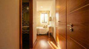 Postel nebo postele na pokoji v ubytování Luxury apt in Plaza de España - FREE parking