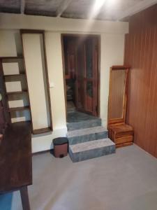 En eller flere senge i et værelse på Ella EDAN Homestay