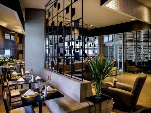 Khu vực ghế ngồi tại Grand Mercure Brasilia Eixo Monumental