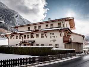 a building with the river written on it at The River by Regina in Sölden +2 photos